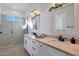 Bathroom with walk-in shower and double vanity at 16041 E Duane Ln, Scottsdale, AZ 85262