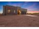 Modern stucco home with stone accents and a two-car garage at 16041 E Duane Ln, Scottsdale, AZ 85262