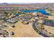 Large community with lake, clubhouse, and amenities at 16731 S 181St Ave, Goodyear, AZ 85338