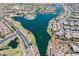 Large lake surrounded by community homes and amenities at 16731 S 181St Ave, Goodyear, AZ 85338