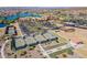 Community overview featuring a lake, clubhouse, and courts at 16731 S 181St Ave, Goodyear, AZ 85338