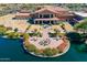 Resort-style community clubhouse with pool and lake views at 16731 S 181St Ave, Goodyear, AZ 85338
