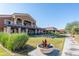 Spanish-style community clubhouse with landscaped grounds at 16731 S 181St Ave, Goodyear, AZ 85338
