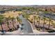 Community entrance with palm trees and signage at 16731 S 181St Ave, Goodyear, AZ 85338