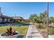 Pathway with fountain and landscaping near community building at 16731 S 181St Ave, Goodyear, AZ 85338