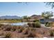 CantaMia community entrance with a pond at 16731 S 181St Ave, Goodyear, AZ 85338