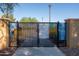 Gated entrance to community pool with rules posted at 16731 S 181St Ave, Goodyear, AZ 85338