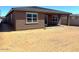 Spacious backyard with covered patio; an ideal canvas for creating an outdoor oasis at 22507 W Pontiac Dr, Surprise, AZ 85387