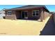 Backyard featuring a covered patio, and ample space for outdoor living and entertainment at 22507 W Pontiac Dr, Surprise, AZ 85387