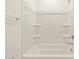 Bright bathroom showcasing a clean white tub and shower combo at 22507 W Pontiac Dr, Surprise, AZ 85387