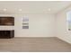 Eat-in kitchen features hardwood floors, neutral walls, a window and dark cabinetry at 22507 W Pontiac Dr, Surprise, AZ 85387