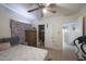 Bedroom with double bed, wardrobe, and access to hallway at 3206 W Garfield St, Phoenix, AZ 85009