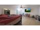 Primary bedroom with ceiling fan, tiled floors, and a double bed at 3206 W Garfield St, Phoenix, AZ 85009