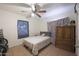 Bedroom with double bed, ceiling fan, and wardrobe at 3206 W Garfield St, Phoenix, AZ 85009