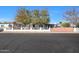 House with a gated entrance and a well-maintained yard at 3206 W Garfield St, Phoenix, AZ 85009