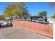 Home with a gated entrance and a large front yard at 3206 W Garfield St, Phoenix, AZ 85009