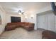 Spacious living room with brown sectional sofa at 3206 W Garfield St, Phoenix, AZ 85009
