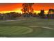 Beautiful sunset view overlooking the manicured greens and lush fairways of the golf course at 3500 N Hayden Rd # 1306, Scottsdale, AZ 85251