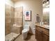 Bathroom with a large walk-in shower, toilet and granite countertop at 7624 E Stagecoach Pass, Carefree, AZ 85377