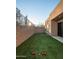 Landscaped backyard with artificial turf and bocce ball court at 7624 E Stagecoach Pass, Carefree, AZ 85377
