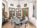 Modern dining room with round table and gray chairs at 7624 E Stagecoach Pass, Carefree, AZ 85377