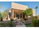 Backyard with stairs leading to a patio and desert landscaping at 7624 E Stagecoach Pass, Carefree, AZ 85377
