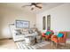 Living room with a comfortable sofa and two armchairs at 7624 E Stagecoach Pass, Carefree, AZ 85377