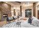 Spacious living area featuring a stone fireplace and high ceilings at 7624 E Stagecoach Pass, Carefree, AZ 85377