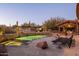 Inviting pool and spa area with a tranquil waterfall feature at 7624 E Stagecoach Pass, Carefree, AZ 85377