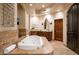 Spa-like Primary bathroom with soaking tub and dual sinks at 7624 E Stagecoach Pass, Carefree, AZ 85377