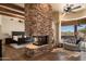 Spacious Primary bedroom with fireplace and hardwood floors at 7624 E Stagecoach Pass, Carefree, AZ 85377