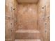 Large walk-in shower with multiple shower heads and built-in bench at 7624 E Stagecoach Pass, Carefree, AZ 85377
