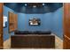 Home theater with comfy seating and large screen at 7624 E Stagecoach Pass, Carefree, AZ 85377