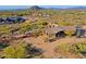 Aerial view of a luxurious home with expansive desert landscape at 8505 E Morning Vista Rd, Scottsdale, AZ 85266