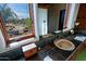 Bathroom with dark slate tile, a large vanity, and a window with scenic views at 8505 E Morning Vista Rd, Scottsdale, AZ 85266