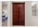 Large wooden built-in closet with ample storage at 10241 E Ampere Ave, Mesa, AZ 85212