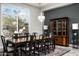 Formal dining room showcasing a dark wood table and Asian-inspired decor at 11821 N Sunset Vista Dr, Fountain Hills, AZ 85268