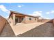 Desert landscape backyard with patio at 17867 W Encinas Ln, Goodyear, AZ 85338