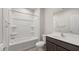Clean bathroom with a tub, shower, and vanity at 17867 W Encinas Ln, Goodyear, AZ 85338