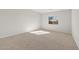 Spacious bedroom with neutral walls and carpet flooring at 17867 W Encinas Ln, Goodyear, AZ 85338