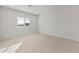 Bright bedroom with carpeted floor and window coverings at 17869 W Getty Dr, Goodyear, AZ 85338