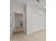 Home hallway with tile flooring and access to other rooms at 17869 W Getty Dr, Goodyear, AZ 85338