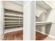 Bright walk-in closet with shelving and rods at 2921 E Lexington Ave, Gilbert, AZ 85234