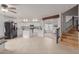 Spacious kitchen with island, stainless steel appliances, and white cabinets at 2985 W Goldmine Mountain Dr, San Tan Valley, AZ 85144