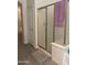 Clean bathroom with glass shower, tiled floors, and a towel at 15 W Mill Reef Dr, San Tan Valley, AZ 85143
