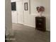 Hallway featuring tile flooring and decorative shelving at 15 W Mill Reef Dr, San Tan Valley, AZ 85143