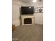 Cozy living room with decorative fireplace and tile flooring at 15 W Mill Reef Dr, San Tan Valley, AZ 85143