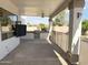 Covered patio with built-in grill and pool views at 1571 E Appaloosa Ct, Gilbert, AZ 85296