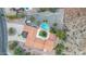 An overhead view of a sprawling home with a pool and desert landscaping at 15912 E Palomino Blvd, Fountain Hills, AZ 85268