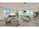 Comfortable living room with a large sectional sofa, bright natural light, and stylish decor offering a relaxing space at 2121 W Sonoran Desert Dr # 29, Phoenix, AZ 85085